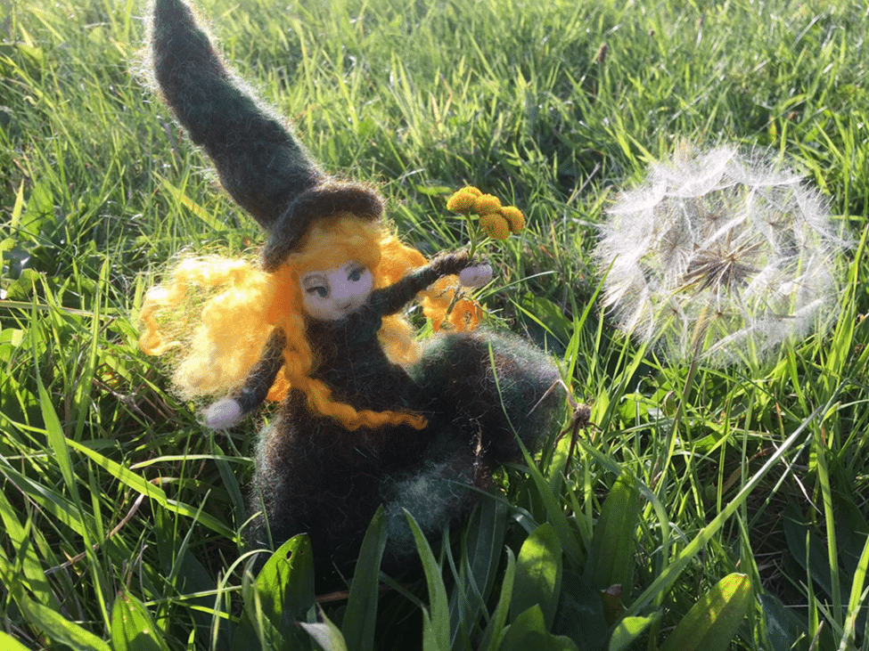 Cute witch for Halloween with locks for hair Enter the Wildwoods